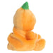 Plush toy shaped like a pumpkin with a green stem on a white background
