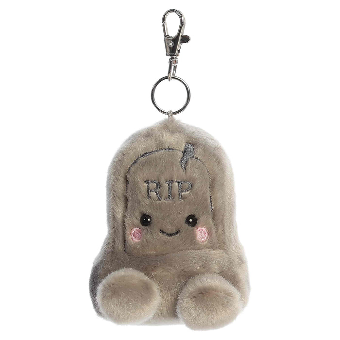 Plush keychain with a tombstone design and 'RIP' text on a white background
