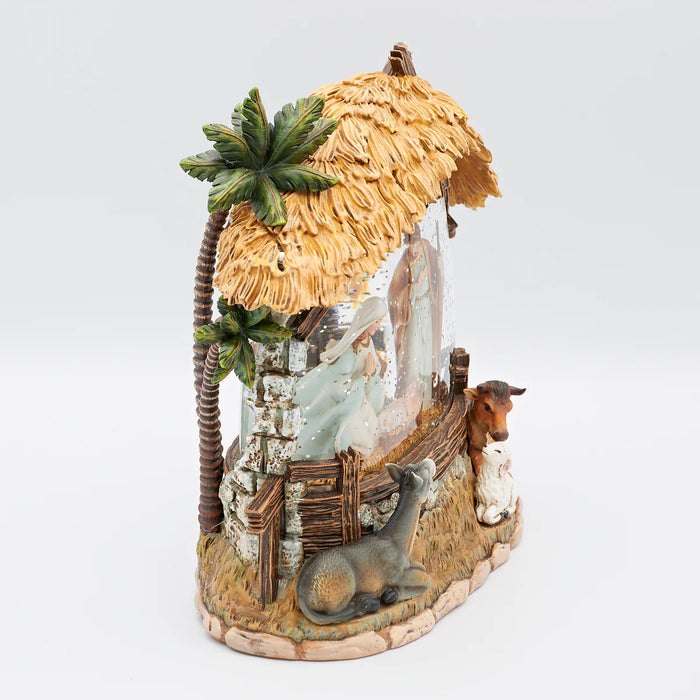 Decorative figurine with animals and a palm tree on a white background