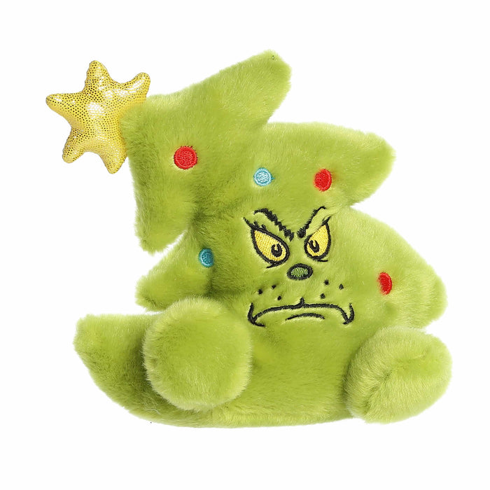 Green plush toy resembling a Christmas tree with a star on top, angry face, and colorful lights.