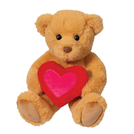 Brown teddy bear with a red heart on a white background