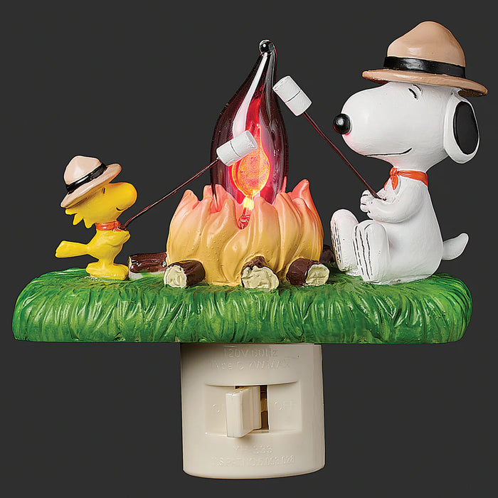 Snoopy and Woodstock around a campfire with marshmallows, night light on a black background