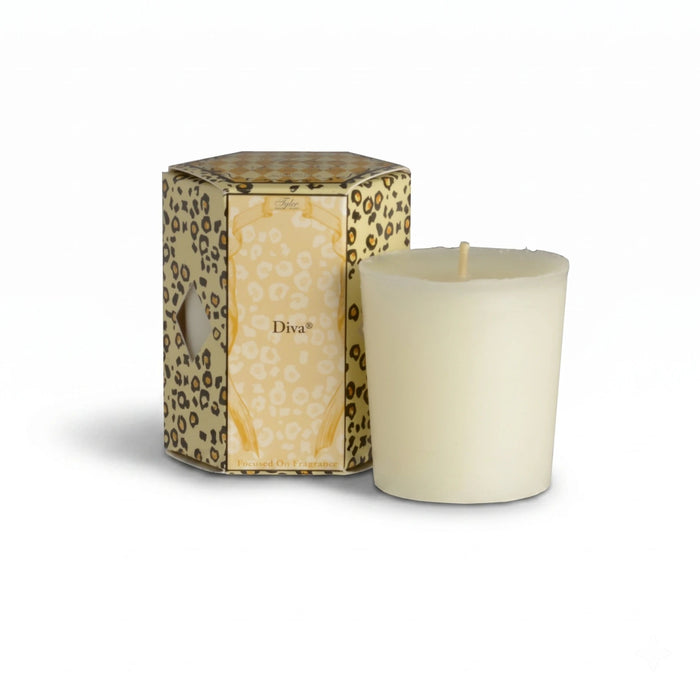 Jar candle with decorative lid on a white background