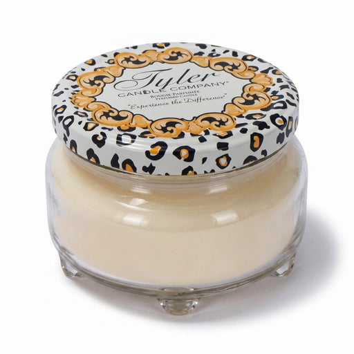 Jar candle with decorative lid on a white background