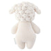 Knitted sheep toy on a white background