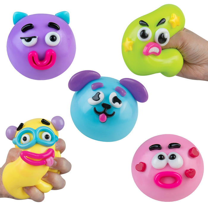 Set of colorful toy faces on a white background