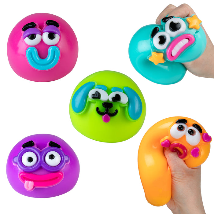 Set of colorful toy faces on a white background