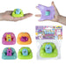 Taba-Licious Couch Potatoes shown stretched, squished, in assorted colors, and in retail packaging.