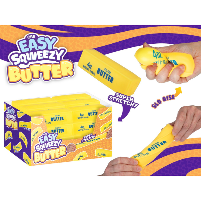 A retail display box and several yellow novelty squeeze butter bars shown with hands demonstrating the stretchy texture. The packaging and product branding read 'Ora Easy Squeezy Butter' with purple, yellow, and orange graphics.