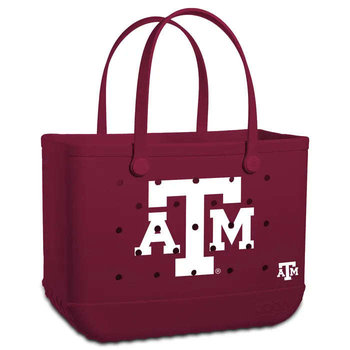 Maroon tote bag with white 'ATM' logo on a white background