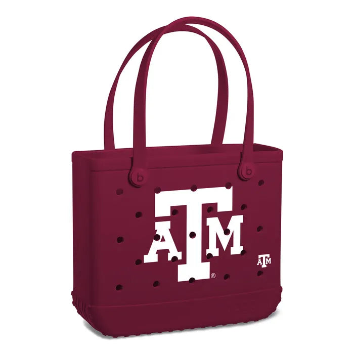 Maroon tote bag with white 'ATM' logo on a white background