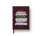 Maroon book journal with book-themed design on a white background