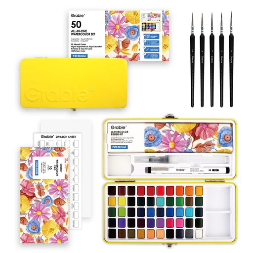Watercolor painting set with watercolor pan, brushes, and swatch sheet on a white background