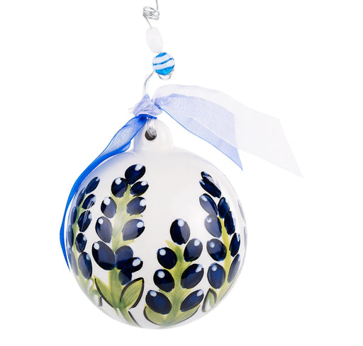 Decorative ornament with blue and green design on a white background