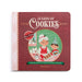 The front cover of the children's book '12 Days of Cookies' by Demodaco, featuring a festive red textured background, a pink-and-white patterned spine, and a central circular illustration of Mrs. Claus baking with a dog and a child.