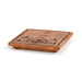 A square wooden serving board or tray with rounded corners, featuring a dark engraved map design and text on the top surface, photographed on a clean white background.