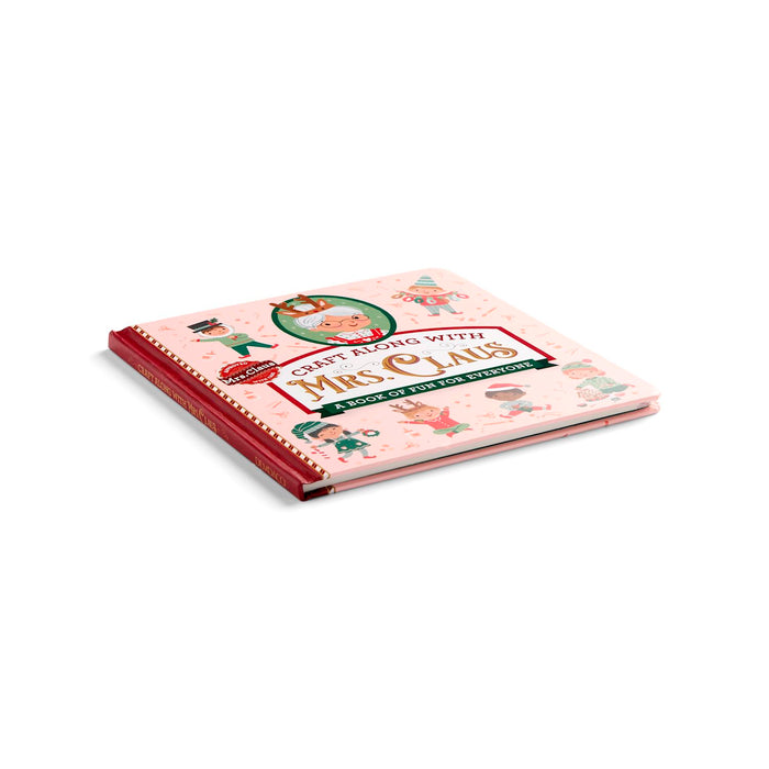 A spiral-bound children's book titled 'Gert Joes with Mrs. Claus' on a clean white background.