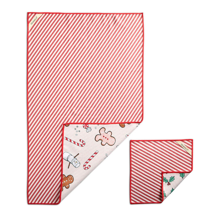 Two red and white striped baby blankets with Christmas-themed designs on the reverse side, displayed on a clean white background.