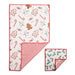 A set of two folded holiday-themed cloth napkins on a white background. The larger napkin features a festive print with gingerbread men, snowmen, candy canes, and marshmallows on a cream background with a red border.
