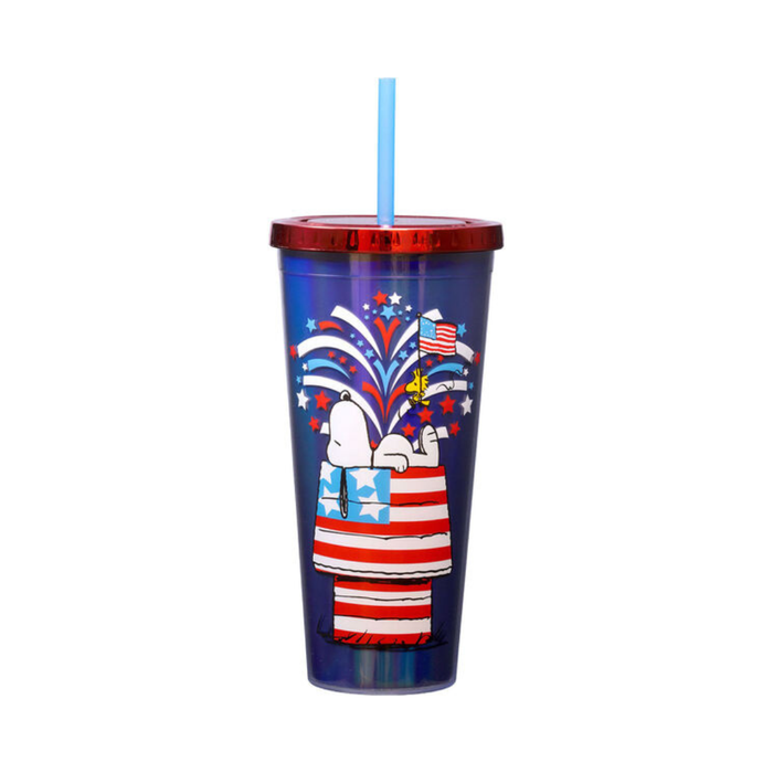 Tumbler with Snoopy design featuring American flags and fireworks on a white background