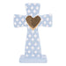 Decorative cross with a heart on a light blue background