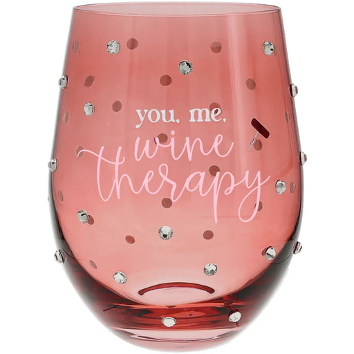 Pink wine glass with 'you. me. wine therapy' text and rhinestone embellishments on a white background