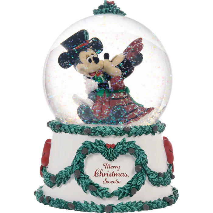 Christmas-themed snow globe with a character inside on a white background