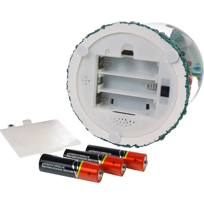 Round electronic device with batteries on a white background