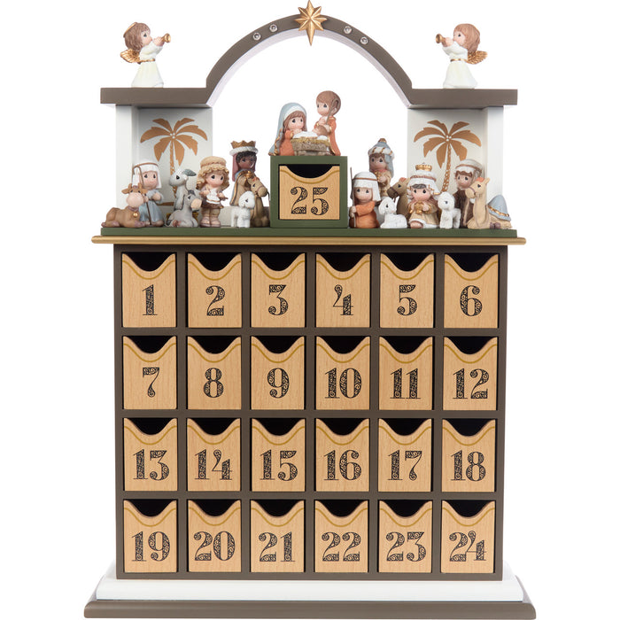 Wooden advent calendar with Nativity scene figures on top