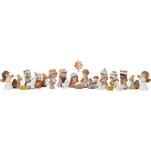 Set of nativity scene figurines on a white background