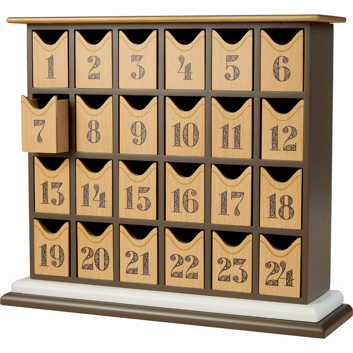 Wooden advent calendar with numbered compartments on a white background