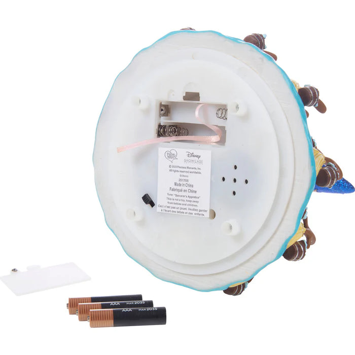 Decorative figurine with batteries on a white background