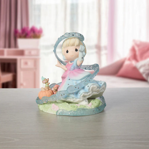 Decorative figurine of a girl with a harp on a table