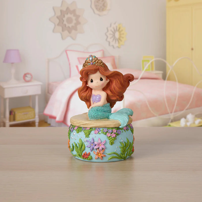 Mermaid figurine on a decorative box in a child's bedroom