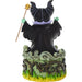 Statue of a witch with a staff on a white background
