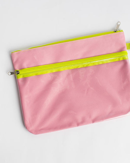 Pink pouch with a yellow zipper on a white background