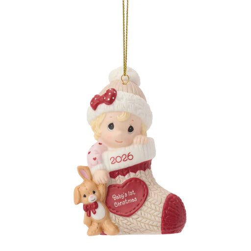 Christmas ornament of a baby in a stocking with a dog, featuring '2026 Baby's 1st Christmas' text.
