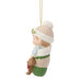 Christmas ornament of a baby in a knitted outfit with a teddy bear on a white background