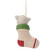 A Christmas stocking ornament shaped like a white cat sitting inside a cream-colored knit stocking with a green cuff and red toe, hanging by a gold string on a white background.
