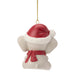 Dog-shaped Christmas ornament with a red hat and scarf on a white background