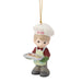 Decorative ornament of a chef holding a tray with '2026' on a white background