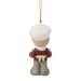 A Christmas ornament shaped like a child dressed as a chef, shown from the back. The figure has a white hat, a burgundy sweater with a pale green bow, gray pants, and a gold hanging string against a plain white background.