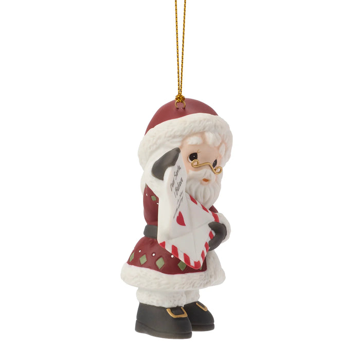 A Santa Claus hanging ornament with a gold hanging string, featuring a white beard, red hat and coat, black boots, and gold glasses, set against a plain white background.