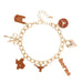 Gold bracelet with various charms on a white background