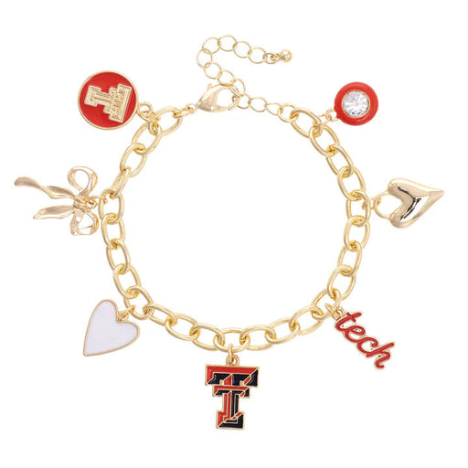 Gold charm bracelet with various charms on a white background