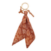 Brown bandana keychain with paisley pattern on a white background