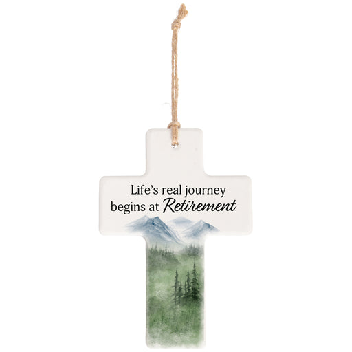 Decorative hanging sign with mountain scene and retirement quote on a white background