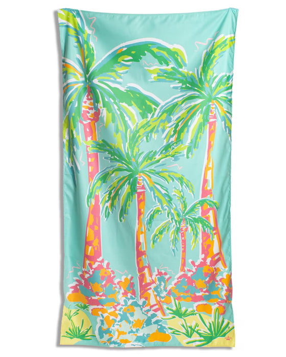 Colorful beach towel with palm tree design on a white background