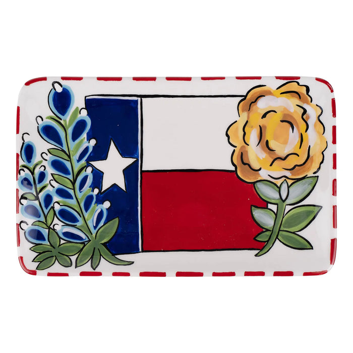 Rectangular plate with Texas flag design, yellow flower, and blue and green plants on a white background