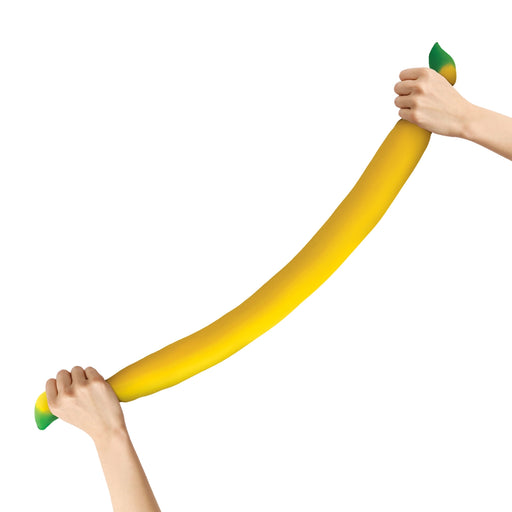 Two hands stretching a long yellow inflatable snake toy against a white background